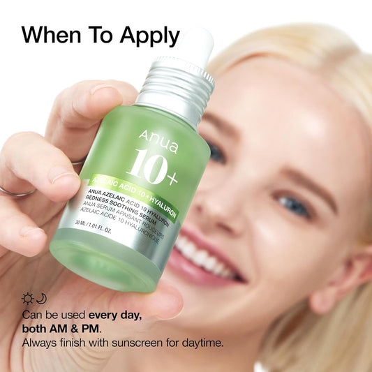 Anua 10+ serum bottle held in a hand, green glass with silver dropper cap