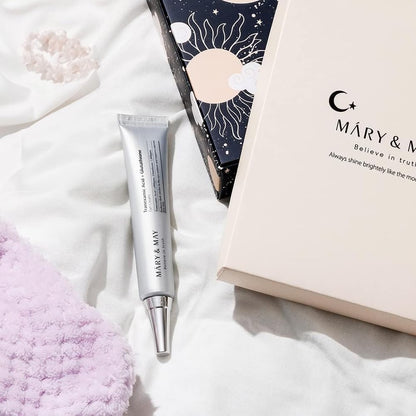 MARY & MAY eye cream tube with product box on white fabric