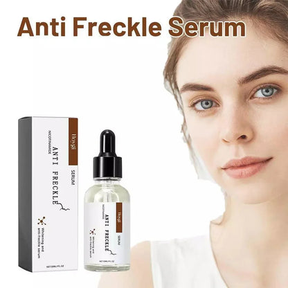 Anti-freckle face serum bottle with black dropper beside white box