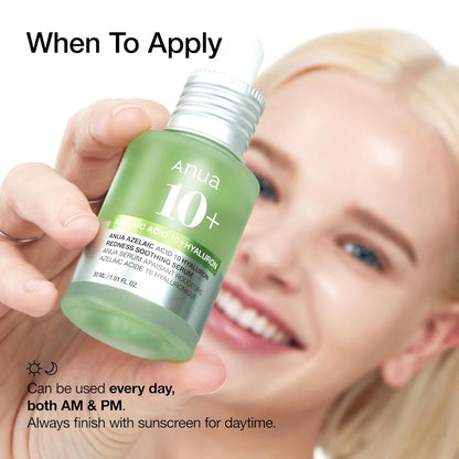 Anua 10+ serum bottle held in a hand, green glass with silver dropper cap