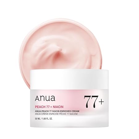 Anua 77+ peach niacin enriched cream jar topped with pale pink cream