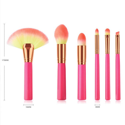Makeup brush set with pink handles and gold ferrules, fan brush plus tapered blending brushes