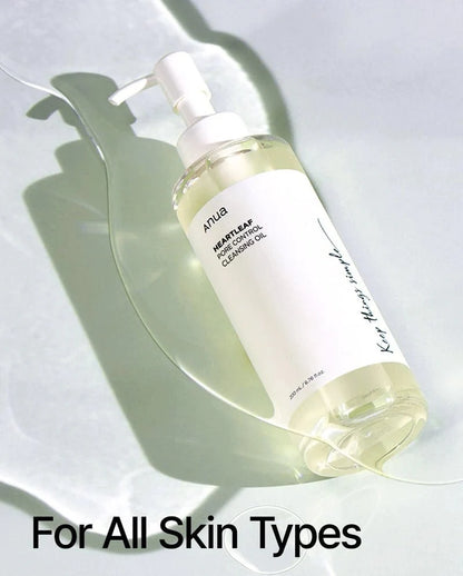 Anua Heartleaf Pore Control cleansing oil bottle with white pump, clear bottle, pale yellow oil