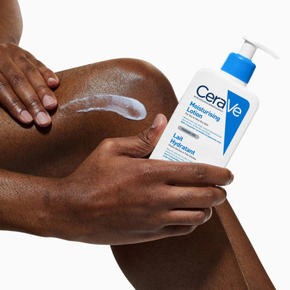 CeraVe moisturising lotion pump bottle held near skin with lotion spread