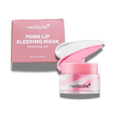 Lip sleeping mask set with pink box and jar plus a smear of glossy cream