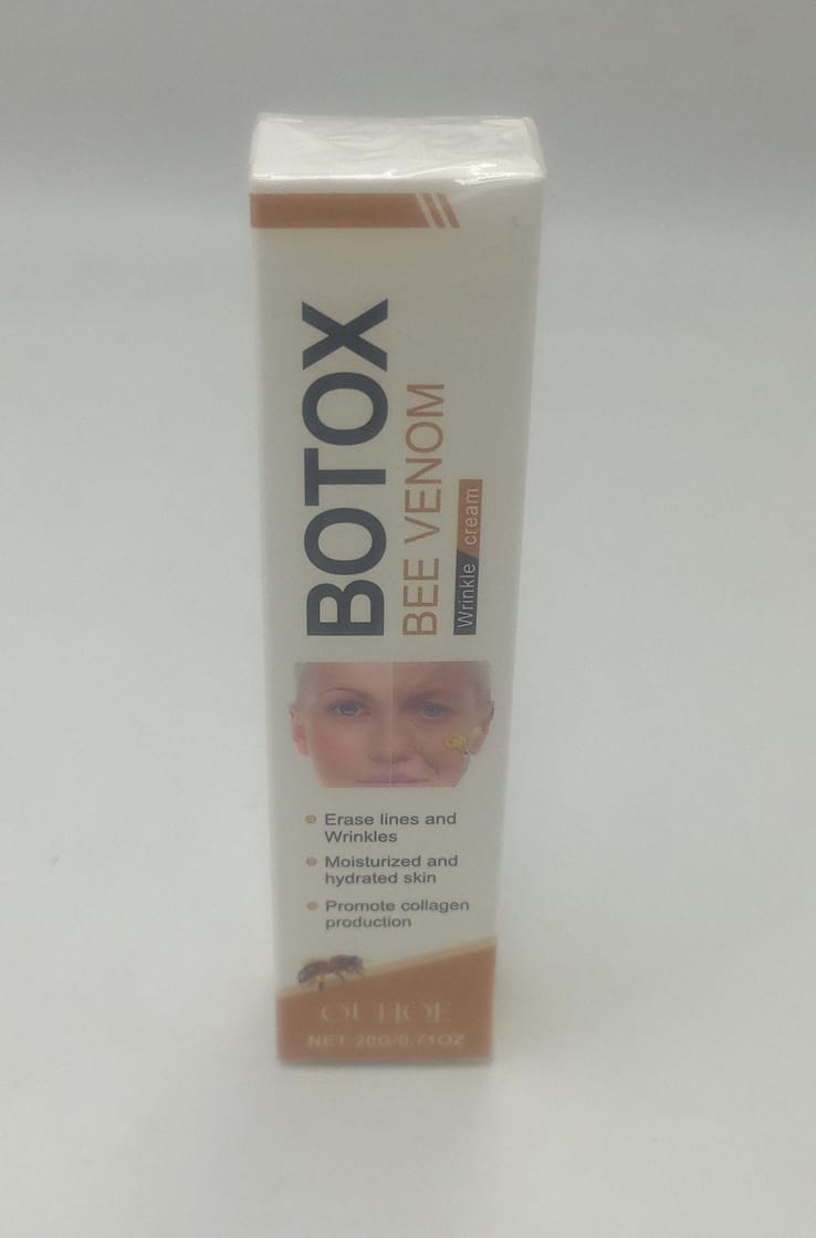 Bee venom wrinkle cream tube standing upright, front label visible in close-up