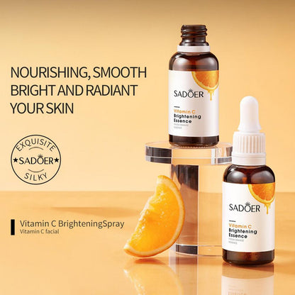 Vitamin C brightening essence bottles with droppers and orange slice accents