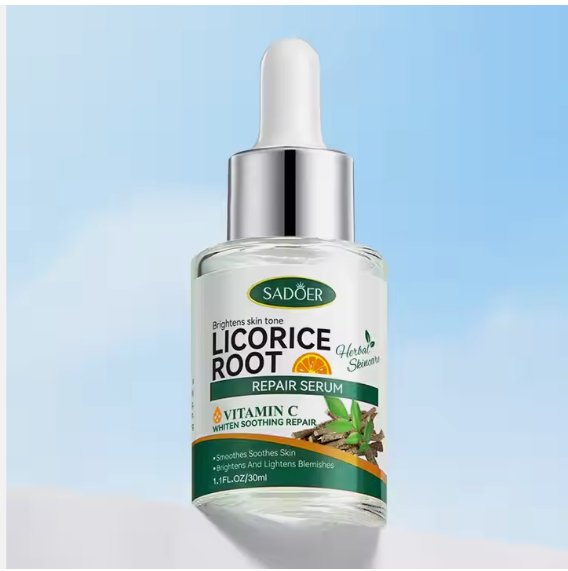 Vitamin C repair face serum bottle with dropper, green label and silver cap.